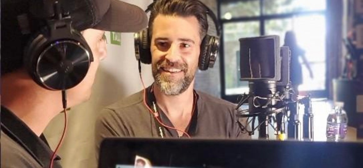 Larry Williams recording a podcast